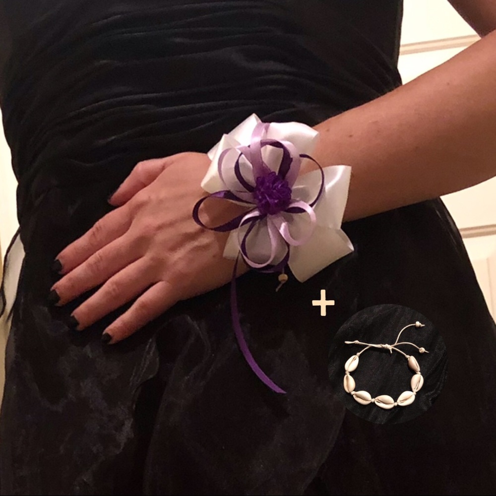 Ribbon wrist corsage on a Hawaiian shell bracelet
